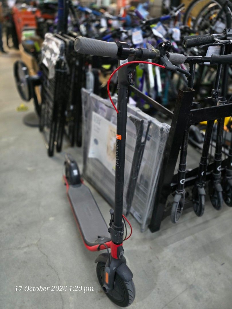 Ninebot Electric Scooter D38E (Category: Skates, Rollerblades & Scooters) located in Manila. Submitted by chawchul (Listing ID 1468543830, Image 1). Description: - Brand: Ninebot Electric Scooter - Color: Stylish black and red colorway - Display: Digital handlebar display showing speed and battery level - Condition: Tested controls and power status, ready to use - Usage: Perfect for daily commutes or casual riding around town.