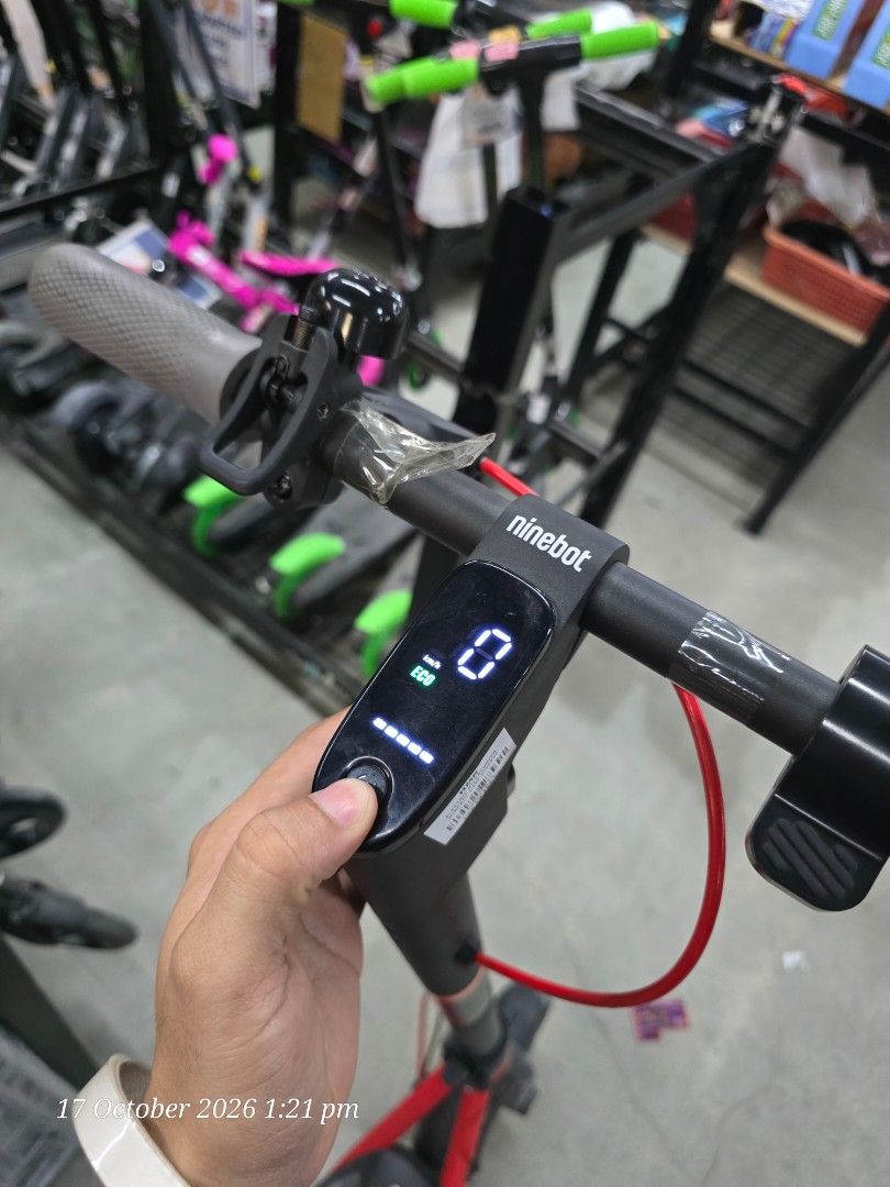 Ninebot Electric Scooter D38E (Category: Skates, Rollerblades & Scooters) located in Manila. Submitted by chawchul (Listing ID 1468543830, Image 3). Description: - Brand: Ninebot Electric Scooter - Color: Stylish black and red colorway - Display: Digital handlebar display showing speed and battery level - Condition: Tested controls and power status, ready to use - Usage: Perfect for daily commutes or casual riding around town.
