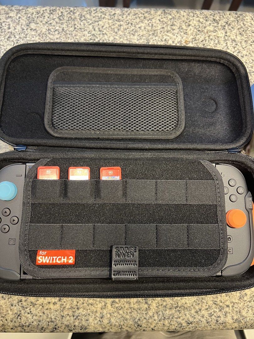Nintendo Switch 2 (Category: Nintendo) located in Silang. Submitted by souisse (Listing ID 1468650613, Image 3). Description: FOR SALE: NINTENDO SWITCH 2 🎮 with complete original accessories Bought last MAY 2026 REASON FOR SELLING: RARELY USED Games Included: * Mario Kart World * Pokemon Pokopia * Legend of Zelda Breath of the Wild Switch 2 Ed. Accessories Included and Installed: Skull and Co. Thumbgrips Skull and Co. FissionGrip Skull and Co. T
