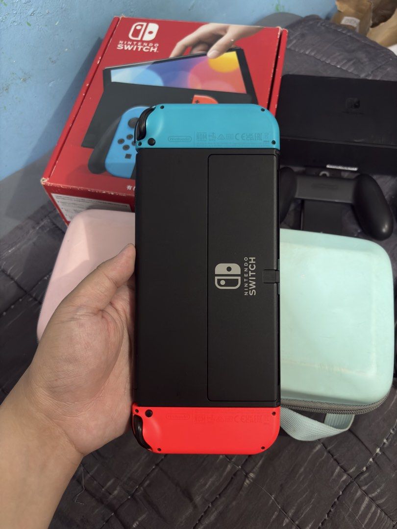 Nintendo Switch OLED with 125 Digital Games (Category: Nintendo) located in Cavite. Submitted by xsavier88 (Listing ID 1468551913, Image 3). Description: 🌟For sale for sale! Nintendo Switch OLED with 125 Digital Games Open for trade sa Nintendo Switch V1/V2/LITE or PS4 add ka cash 10,500 PHP 10,500 PHP 10,500 PHP 🌟INCLUSIONS: Complete Accessories with Box Carrying Pouch 125 Digital Games (Check the attached images for the list of games 🌟ADD-ON
