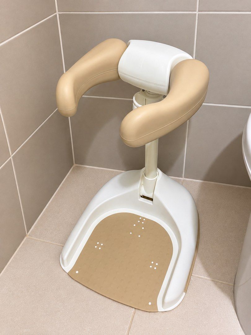 NIVICO Baby Bath Support Stand (Category: Toilet Training) located in Mandaluyong City. Submitted by fidgetcracker (Listing ID 1468501551, Image 1). Description: - Brand/Model: NIVICO Baby Bath Support Stand - Color: Elegant beige and white - Material: Durable, high-quality plastic - Features: Comfortable padded armrests for secure holding .