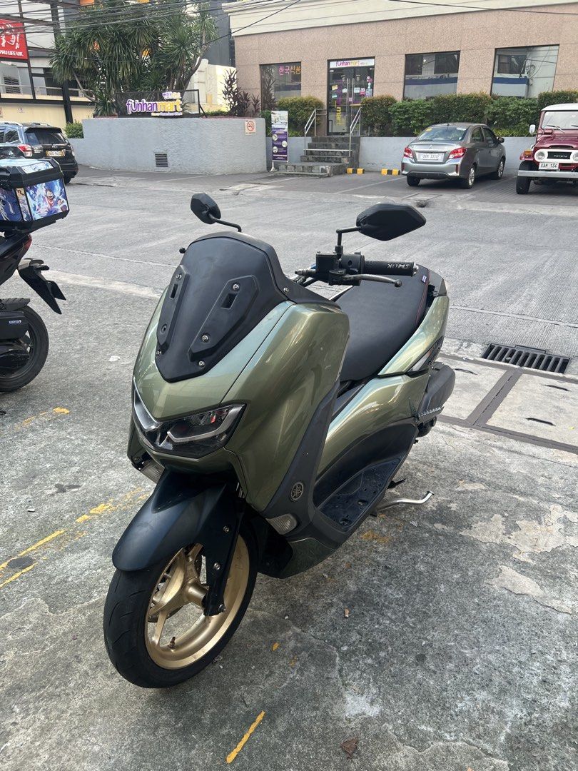 Nmax V2 ABS KEYLESS (Category: Motorbikes for Sale) located in Manila. Submitted by karlluigi_ (Listing ID 1468503635, Image 1). Description: NMAX V2 ABS KEYLESS 2021 model 33k odo all stock engine registered 2027 orig orcr lto plate open dos 1st owner id 3 signatures 1 key, ubox key, red code Naked Handlebar Loud horn (Airhorn) Semi low front shock 80% white gold bolts Leivenger rear shock bago ball race no issue 👌🏽 ₱85k slight nego 📍Tondo / 