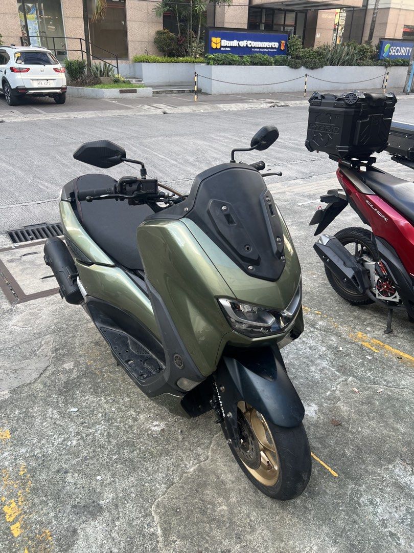 Nmax V2 ABS KEYLESS (Category: Motorbikes for Sale) located in Manila. Submitted by karlluigi_ (Listing ID 1468503635, Image 2). Description: NMAX V2 ABS KEYLESS 2021 model 33k odo all stock engine registered 2027 orig orcr lto plate open dos 1st owner id 3 signatures 1 key, ubox key, red code Naked Handlebar Loud horn (Airhorn) Semi low front shock 80% white gold bolts Leivenger rear shock bago ball race no issue 👌🏽 ₱85k slight nego 📍Tondo / 