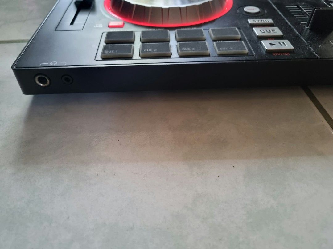 Numark Mixtrack Pro 3 DJ Controller (Category: Controllers) located in Angeles City. Submitted by roshangaming (Listing ID 1468569855, Image 3). Description: - Model: Numark Mixtrack Pro 3 (for Serato DJ) - Features: Dual decks with metal jog wheels, pitch sliders, performance pads, and central mixer section - Condition: Normal signs of use on the chassis, fully working - Inclusions: USB cable, RCA audio output cables - Ports: Front panel headpho