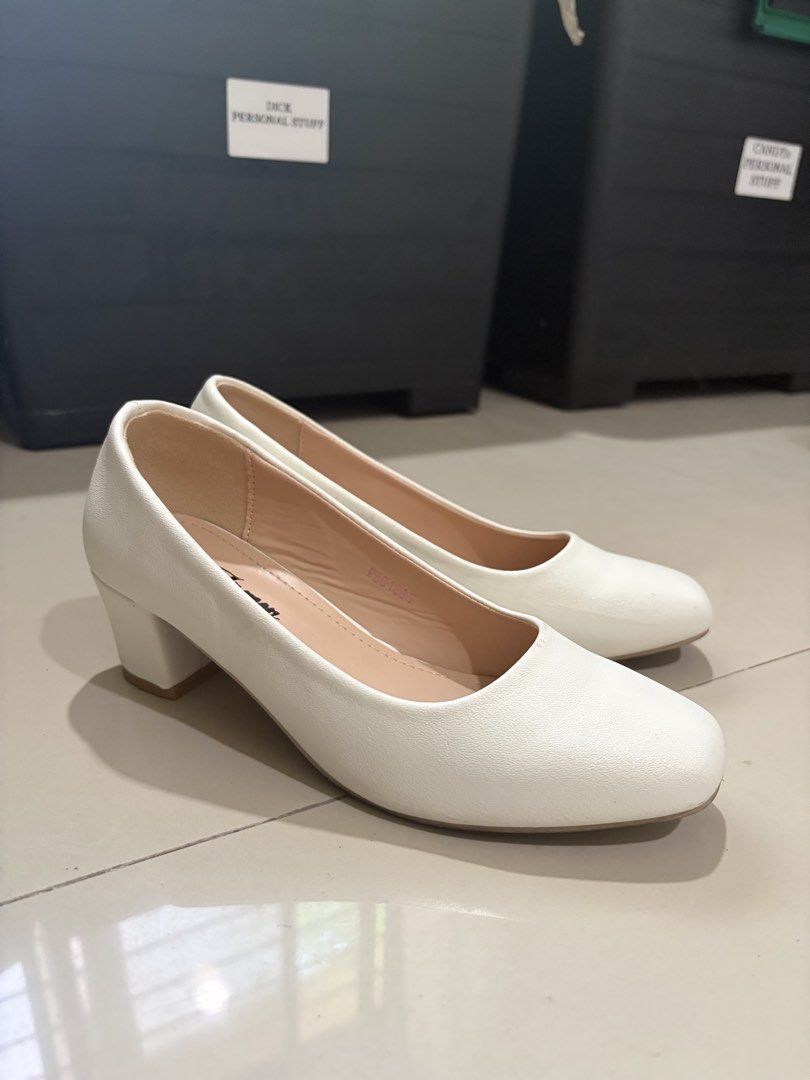 Nursing Heels (Category: Heels) located in Quezon City. Submitted by pandesauuur (Listing ID 1468564746, Image 1). Description: - Brand/Model: Aimen white block heels - Size: 36 (stamped inside) - Heel: Chunky and very easy to walk in - Toe Shape: Rounded square toe - Lining: Light beige inner lining - Condition: Clean overall with minor scuff marks near the back side.