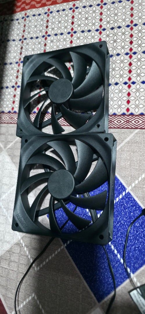NZXT 120mm Black PC Case Fans Pair (Category: Computer Parts) located in Singapore. Submitted by atomizer22 (Listing ID 1468510927, Image 1). Description: - Quantity: 2 black NZXT case fans $5 each - Condition: New, fully working (pulled from a new casing) - Design: Standard square frame with multi-blade setup - Connection: Attached cables with standard fan connectors - Best for: Reliable airflow in standard desktop builds - Self-collection or ma