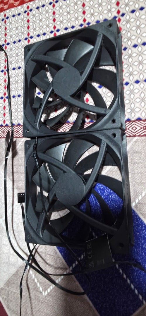 NZXT 120mm Black PC Case Fans Pair (Category: Computer Parts) located in Singapore. Submitted by atomizer22 (Listing ID 1468510927, Image 2). Description: - Quantity: 2 black NZXT case fans $5 each - Condition: New, fully working (pulled from a new casing) - Design: Standard square frame with multi-blade setup - Connection: Attached cables with standard fan connectors - Best for: Reliable airflow in standard desktop builds - Self-collection or ma