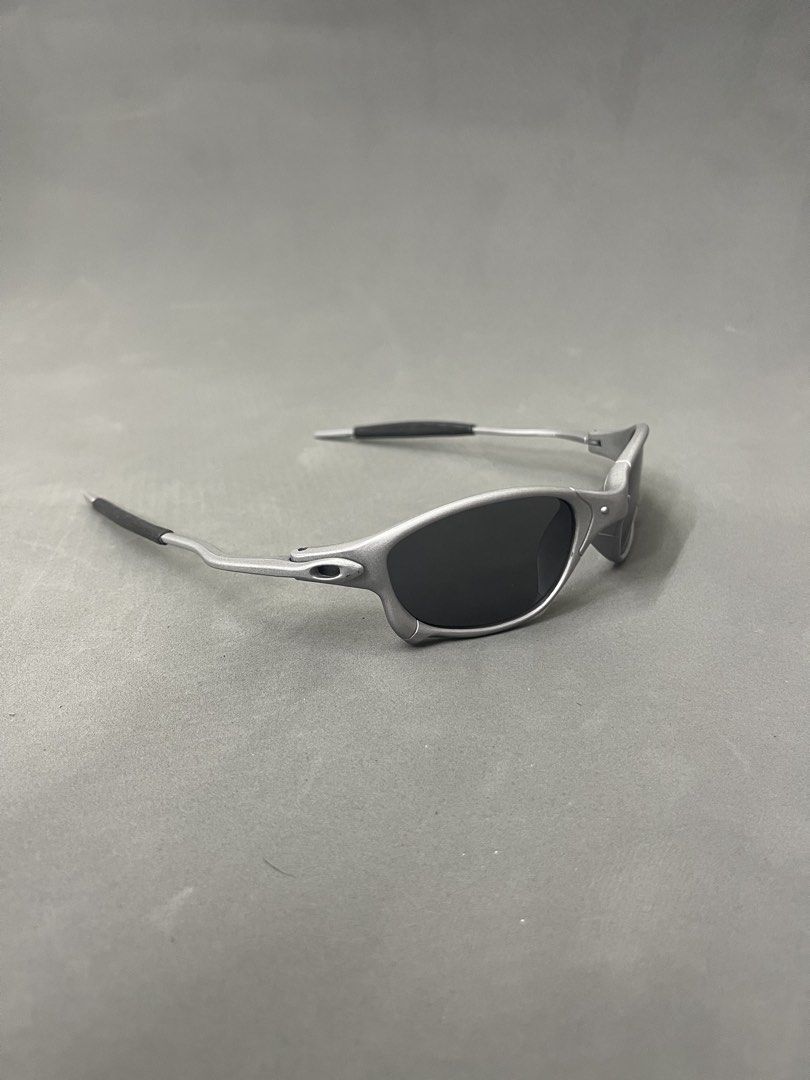 Oakley Juliet Sunglasses Silver Black (Category: Strollers) located in Manila. Submitted by mine2ownit (Listing ID 1468591290, Image 3). Description: - Model: Oakley Juliet sunglasses - Frame: Durable silver metal frame with iconic futuristic design and distinct nose bridge hardware - Lenses: Dark black lenses, perfect for outdoor wear - Details: Features comfortable rubber ear stems and solid build quality - Condition: Great daily shades, ideal 