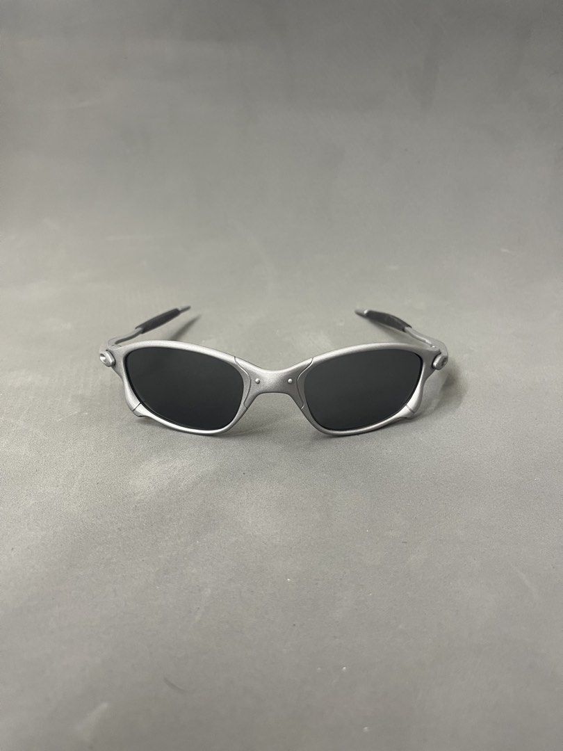 Oakley Juliet Sunglasses Silver Black (Category: Strollers) located in Manila. Submitted by mine2ownit (Listing ID 1468591290, Image 1). Description: - Model: Oakley Juliet sunglasses - Frame: Durable silver metal frame with iconic futuristic design and distinct nose bridge hardware - Lenses: Dark black lenses, perfect for outdoor wear - Details: Features comfortable rubber ear stems and solid build quality - Condition: Great daily shades, ideal 