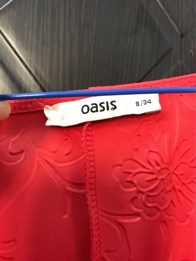 OASIS PEPLUM ORANGE RED BLOUSE TOP (Category: Sleeveless) located in Marikina City. Submitted by minimalistmanila (Listing ID 1468551649, Image 3). Description: Imported Oasis peplum top from London. With embossed type fabric. Color is orangey red. S/M fit. Perfect for a hot date out. Order now!.