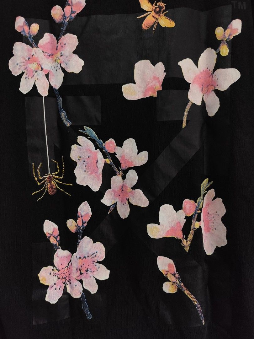 Off white (Category: Tshirts & Polo Shirts ) located in Kabacan. Submitted by thriftpingts (Listing ID 1468514857, Image 3). Description: OFf white cherry blossom Condition: 9.8/10 Color rate : 9.8/10 W: 22 L: 28 Washtags: ✅ Issue: X.