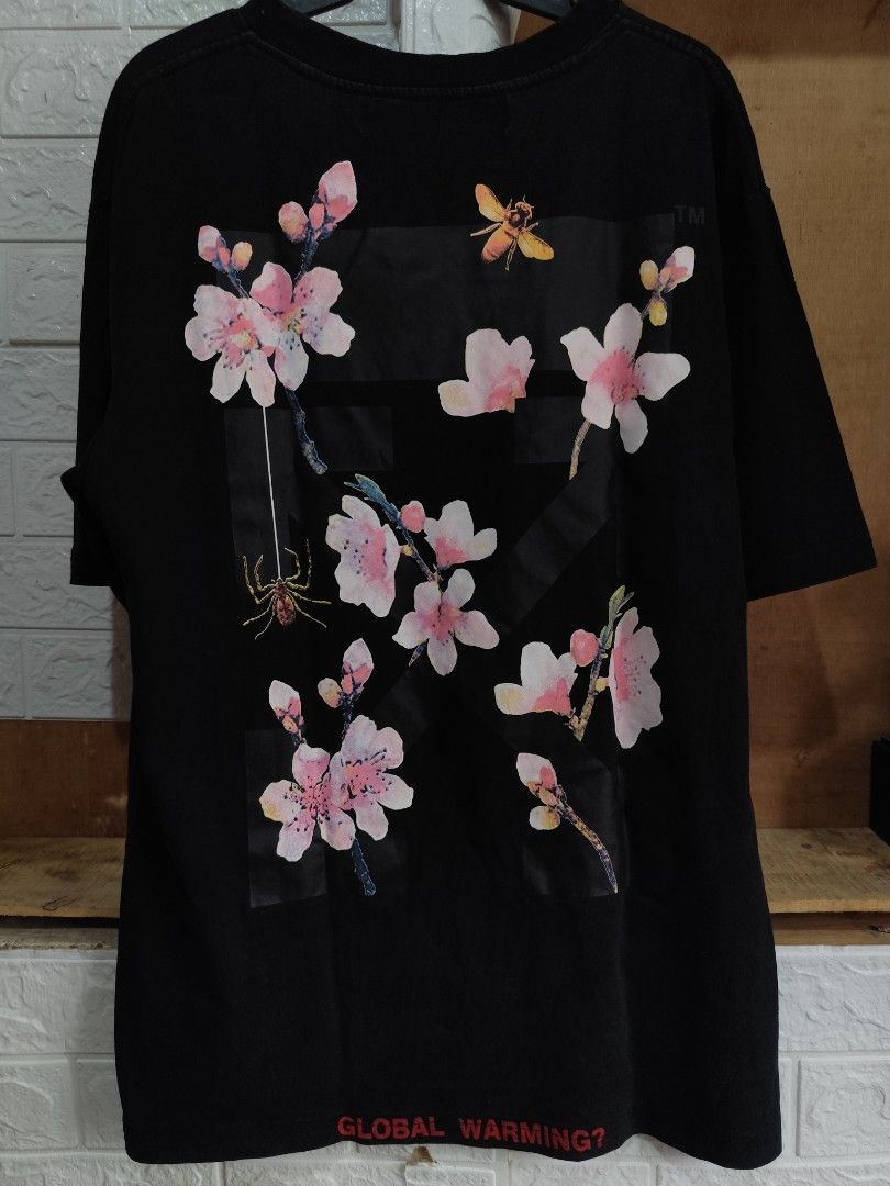 Off white (Category: Tshirts & Polo Shirts ) located in Kabacan. Submitted by thriftpingts (Listing ID 1468514857, Image 2). Description: OFf white cherry blossom Condition: 9.8/10 Color rate : 9.8/10 W: 22 L: 28 Washtags: ✅ Issue: X.