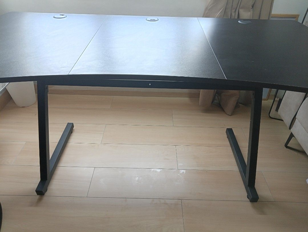 Office/study table (Category: Tables & Sets) located in Kuala Lumpur. Submitted by liza_izan (Listing ID 1468529252, Image 2). Description: - Color & Finish: Sleek large black desk - Ergonomics: Comfortable curved front edge with cable hole - Frame: Sturdy metal legs with under-desk support beams for maximum stability.