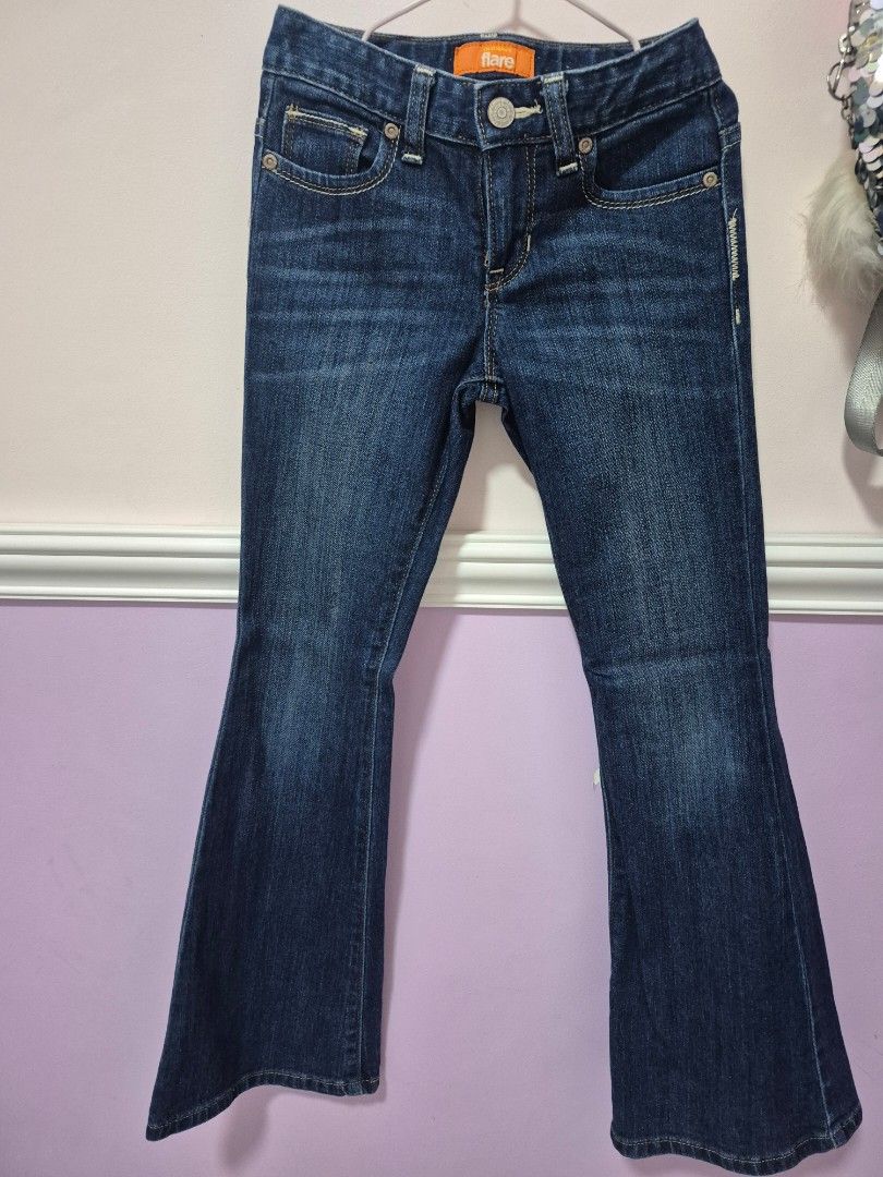 Old Navy Flare Slim Jeans Size 8 (Category: Babies & Kids Fashion) located in Santo Tomas. Submitted by bellaswann18 (Listing ID 1468541037, Image 1). Description: - Brand: Old Navy - Style: Dark wash flare leg with slim fit through hips and thighs - Size: 8 - Features: Adjustable interior button waistband, classic 5-pocket design, orange label tag - Material: Cotton, polyester, and spandex blend for a comfortable stretch - Condition: Excellent p
