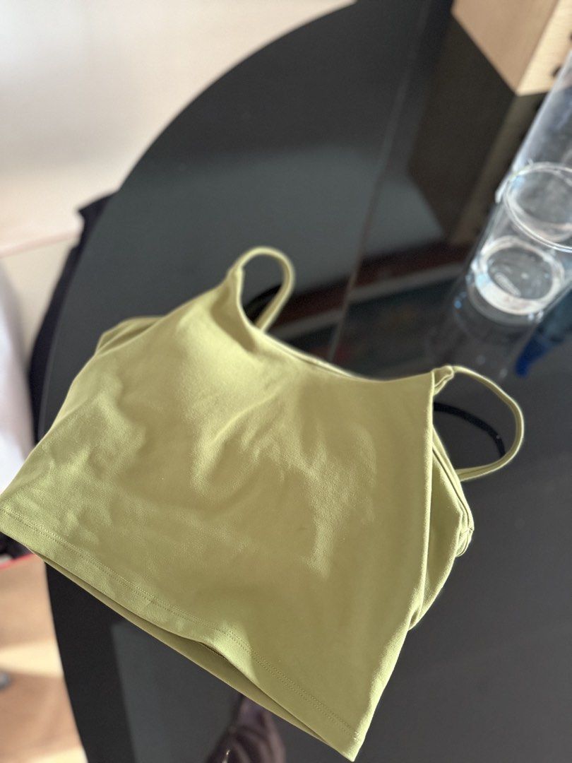 Olive Green Activewear Crop Top (Category: Activewear) located in Mandaluyong City. Submitted by declutteringmylife101 (Listing ID 1468577109, Image 2). Description: - Color: Olive green - Style: Activewear crop top with built-in support - Material: Soft and stretchy fabric - Versatility: Great for workouts, yoga, or everyday casual wear - Matching: Easy to pair with high-waisted leggings or shorts - Home: Clean, smoke-free environment.