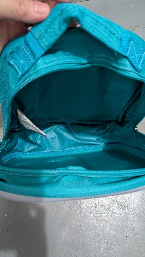 Oops 3D Bird Backpack Kids Bag (Category: Diaper Bags & Wetbags) located in Tanay. Submitted by misyelleysim (Listing ID 1468627816, Image 3). Description: - Brand: Oops - Design: Fun 3D colorful bird front - Color: Turquoise blue straps and back panel - Size: Approx. 12.6 x 9 x 4.3 inches (ideal for toddlers/preschoolers) - Condition: Clean inside and out, ready for use - Features: Main zipper compartment with clean inner lining and original tag