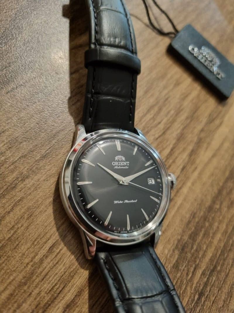 Orient Bambino 38mm RA-AC0M02B (Category: Luxury Watches) located in Manila. Submitted by seikowatchfactory (Listing ID 1468538682, Image 1). Description: Model: RA-AC0M02B Price: 11500 pesos Specifications: Caliber F6724 Automatic Movement 40 hours Power Reserve 22 Jewels Case Material: Stainless Steel Case Diameter: 38.4mm Case Thickness: 12.5mm 30m Water Resistance Mineral Glass Leather Strap Weight: 54g Seller is Authorized Dealer of Japanese