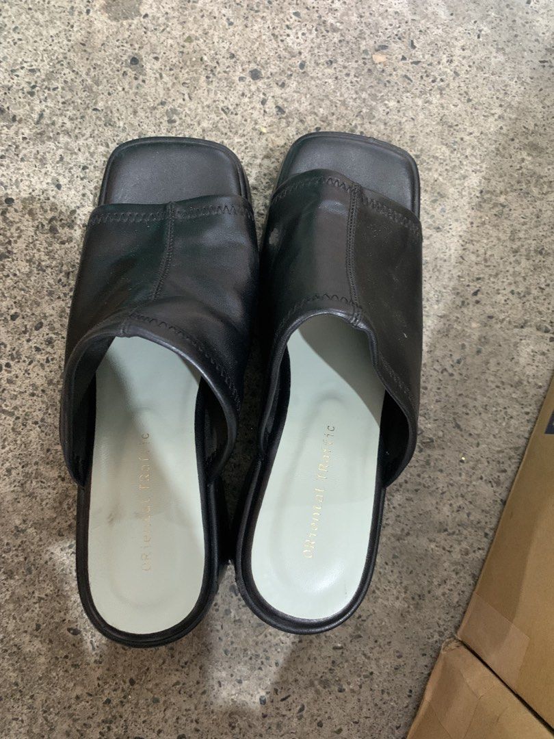 Oriental Traffic Black Chunky Platform Mules Sandals (Category: Heels) located in Manila. Submitted by thriftnivee (Listing ID 1468586651, Image 2). Description: - Brand: Oriental Traffic - Style: Slip-on platform mules with square toe - Heels: Thick chunky heels with a sturdy platform base - Comfort: Cushioned inner sole stamped with the brand logo.