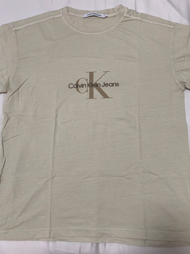 Original Calvin Klein Shirt (Beige) (Category: Tshirts & Polo Shirts ) located in Quezon City. Submitted by arbyyy (Listing ID 1468592883, Image 1). Description: Brand new. Never been used..
