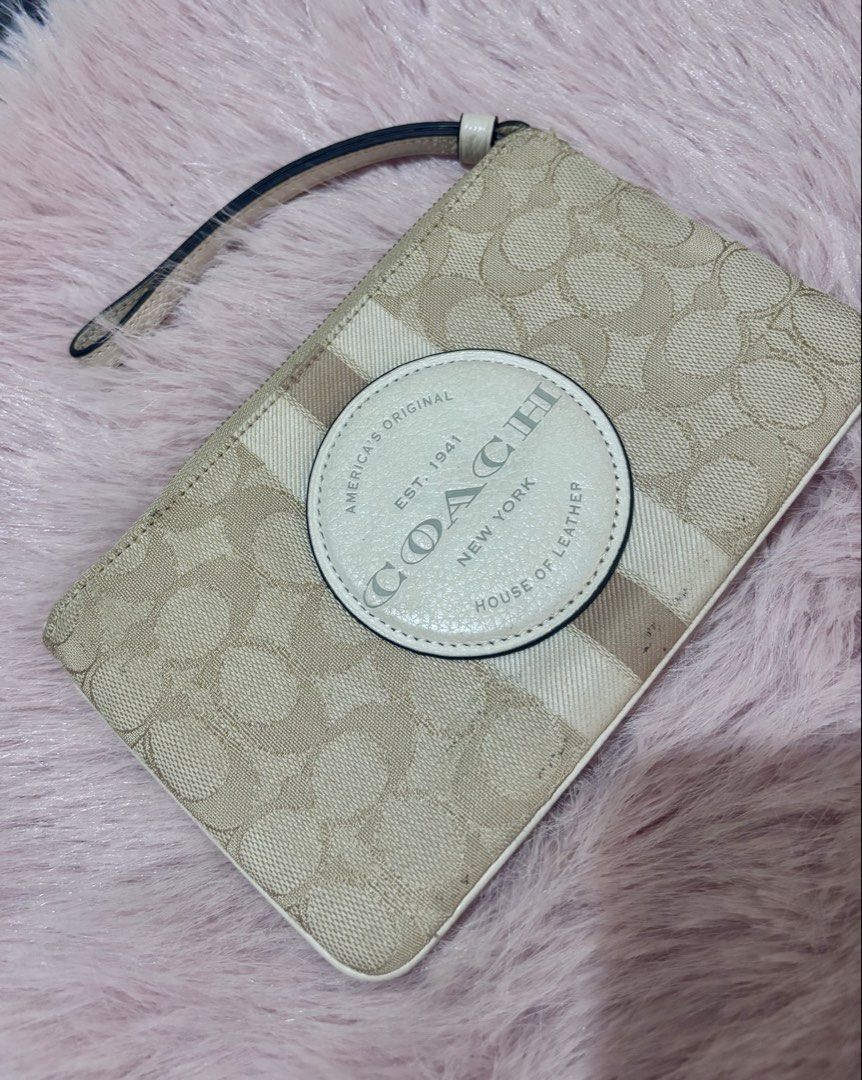 ORIGINAL COACH PURSE WALLET (Category: Purses & Pouches) located in Manila. Submitted by keyttttt_keyttttt (Listing ID 1468535064, Image 1). Description: Decluttering sale! Letting go of my original Coach purse bag. Perfect for anyone looking for a classy designer bag at a more affordable price! ✔️ 100% Original Coach ✔️ Good condition ✔️ Seldom used ✔️ With minimal flaw — may mantsa lang sa lower part ng purse ✔️ Still presentable and perfect fo