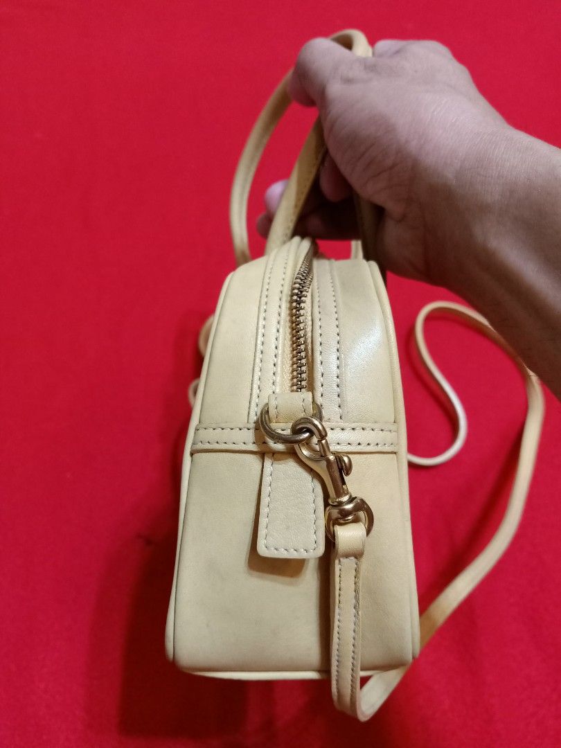Original coach vintage small leather 2way bag (Category: Cross-body Bags) located in Binmaley. Submitted by fashionluxury058 (Listing ID 1468659663, Image 3). Description: original coach vintage small leather 2way bag in very good condition size: small genuine leather color yellow.