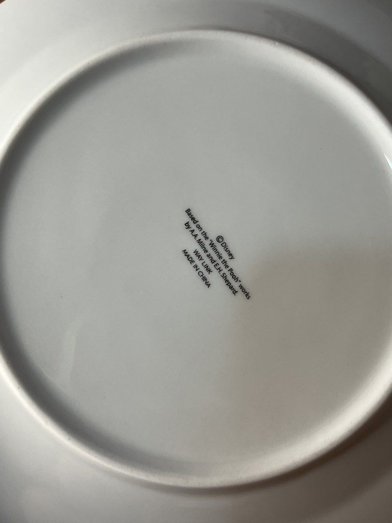 Original Disney Winnie the Pooh Plate with Box (Category: Dinnerware & Cutlery) located in Gapan. Submitted by lunashop14 (Listing ID 1468692421, Image 3). Description: - Official Disney merchandise by Way Link, based on A.A. Milne and E.H. Shepard works - Features a charming illustration of Winnie the Pooh hugging Piglet with flowers and a butterfly - Brand new and never used, in pristine condition - Comes complete with the original purple Disne
