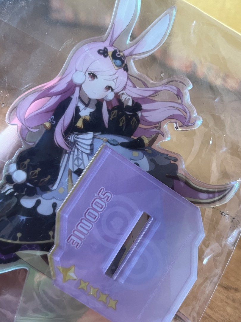 Original Eversoul Soonie Acrylic Standee Figure (Category: Designer & Blind Box Toys) located in Gapan. Submitted by lunashop14 (Listing ID 1468693442, Image 3). Description: - Official Eversoul merchandise - Character: Soonie (Pink hair, bunny ears design) - Includes base stand with printed character name - Japanese branding on the reverse side - Condition: Brand new, still sealed in original plastic packaging.