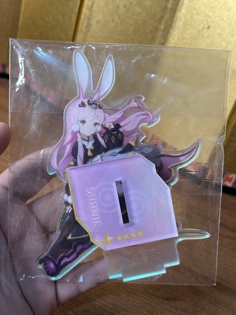 Original Eversoul Soonie Acrylic Standee Figure (Category: Designer & Blind Box Toys) located in Gapan. Submitted by lunashop14 (Listing ID 1468693442, Image 1). Description: - Official Eversoul merchandise - Character: Soonie (Pink hair, bunny ears design) - Includes base stand with printed character name - Japanese branding on the reverse side - Condition: Brand new, still sealed in original plastic packaging.
