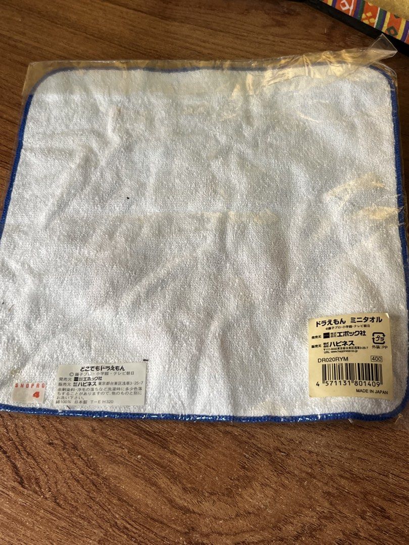 Original Japan Doraemon Mini Towel (Category: Towels, Napkins & Holders) located in Gapan. Submitted by lunashop14 (Listing ID 1468693130, Image 3). Description: - 100% authentic Doraemon mini towel with Shikoku regional design - Made in Japan with high-quality terry cloth - Brand new, unopened in original plastic packaging with store sticker - Official Shopro merchandise manufactured by Epoch - Perfect for collectors and daily use.