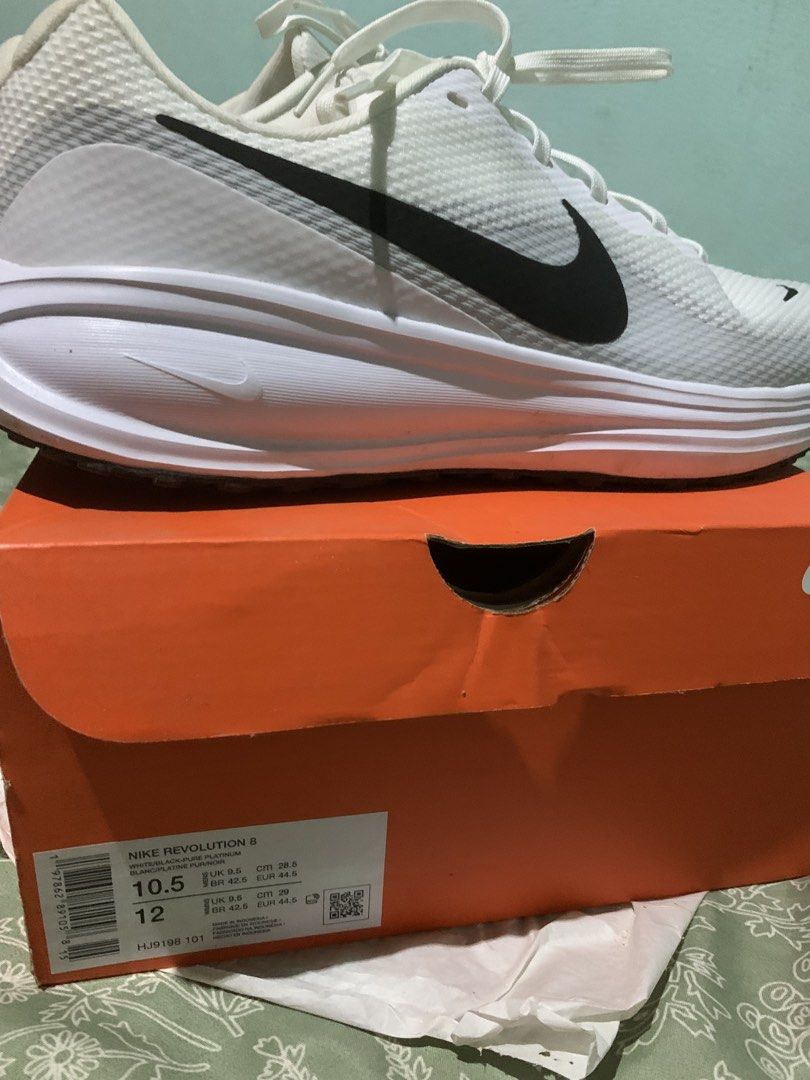 Original Nike Revolution 8 (Category: Sneakers) located in Camalig. Submitted by ryrilim (Listing ID 1468607960, Image 2). Description: Bought from Gateway Mall Cubao Used twice Ships via J&T Shipping will be shouldered by the buyer.