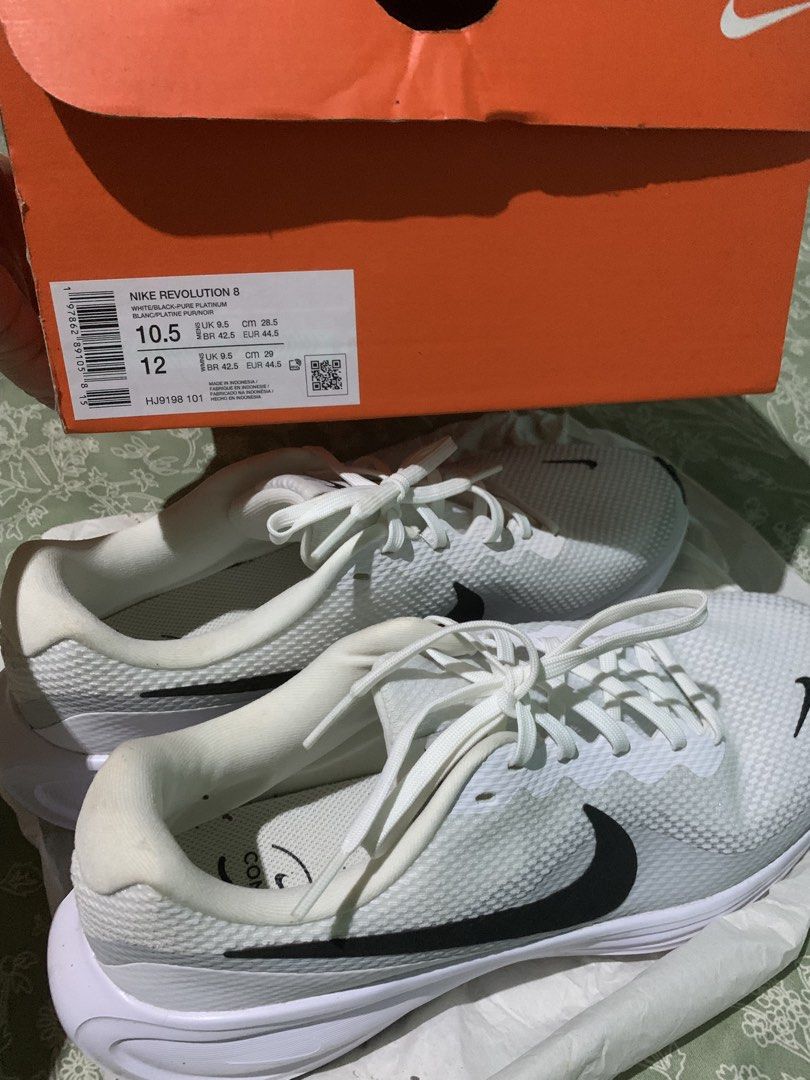 Original Nike Revolution 8 (Category: Sneakers) located in Camalig. Submitted by ryrilim (Listing ID 1468607960, Image 3). Description: Bought from Gateway Mall Cubao Used twice Ships via J&T Shipping will be shouldered by the buyer.