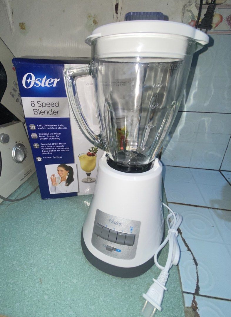 Oster 8-speed blender (Category: Juicers, Blenders & Grinders) located in Malabon City. Submitted by hanschannn (Listing ID 1468568276, Image 1). Description: Oster 8-speed blender with heat resistant glass har • Used only once • Power: 450 watt motor • Speed: 8-speed settings • Function: Continuous blending (buttons 1-3 and 5-7) or Pulse blending (buttons 4 & 8 buttons) • Durability: Exclusive All-Metal Drive™ system • Blade: High performance ic