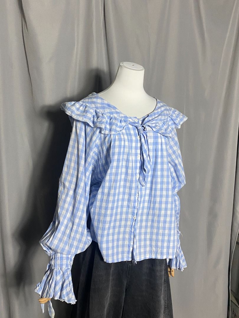 Oversized light blue gingham long sleeves top (Category: Longsleeves) located in Las Pinas. Submitted by ipickyou (Listing ID 1468682434, Image 3). Description: Unwashed Condition: 10/10 𝗠𝗲𝗮𝘀𝘂𝗿𝗲𝗺𝗲𝗻𝘁𝘀 𝘄𝗵𝗲𝗻 𝗹𝗮𝗶𝗱 𝗳𝗹𝗮𝘁: -Armpit to armpit: 22” -Length: 24F, 23B” .