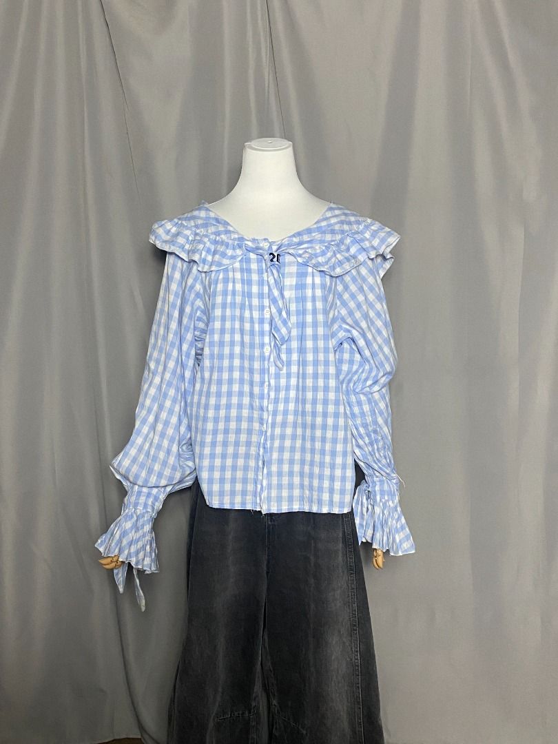 Oversized light blue gingham long sleeves top (Category: Longsleeves) located in Las Pinas. Submitted by ipickyou (Listing ID 1468682434, Image 2). Description: Unwashed Condition: 10/10 𝗠𝗲𝗮𝘀𝘂𝗿𝗲𝗺𝗲𝗻𝘁𝘀 𝘄𝗵𝗲𝗻 𝗹𝗮𝗶𝗱 𝗳𝗹𝗮𝘁: -Armpit to armpit: 22” -Length: 24F, 23B” .