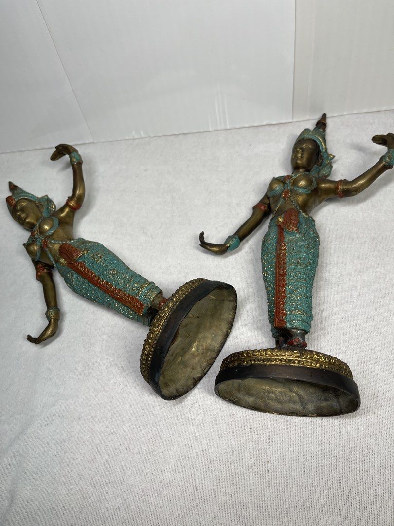 PAIR OF THAI-STYLE CLASSICAL DANCER STATUES (Category: Other Home Decor) located in Mandaluyong City. Submitted by coolmeybab (Listing ID 1468603838, Image 3). Description: Add an elegant touch of Southeast Asian artistry to your home with this beautiful pair of traditional Thai-style dancer figurines! ✨ Intricately detailed traditional costumes and headdresses ✨ Beautiful bronze-tone finish with turquoise-green and reddish accents ✨ Graceful dan