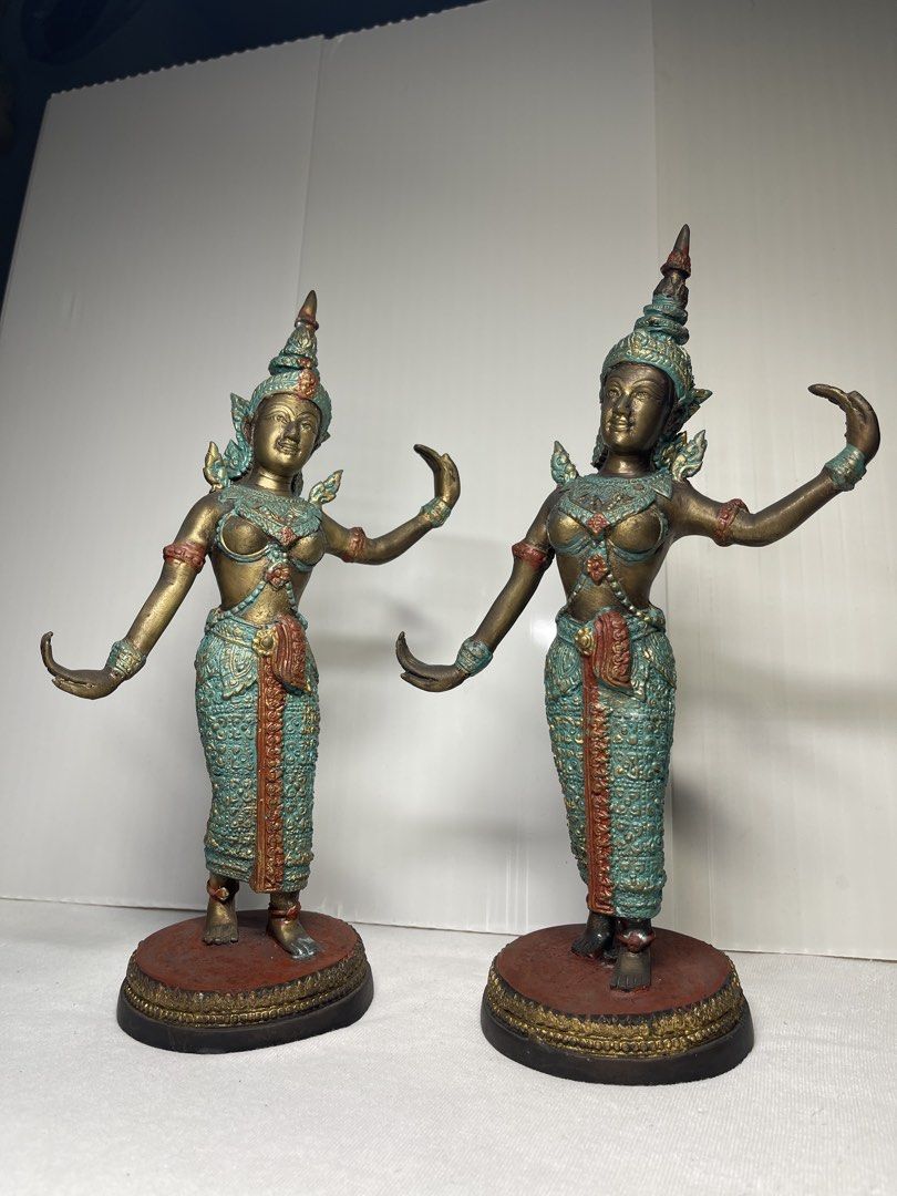 PAIR OF THAI-STYLE CLASSICAL DANCER STATUES (Category: Other Home Decor) located in Mandaluyong City. Submitted by coolmeybab (Listing ID 1468603838, Image 1). Description: Add an elegant touch of Southeast Asian artistry to your home with this beautiful pair of traditional Thai-style dancer figurines! ✨ Intricately detailed traditional costumes and headdresses ✨ Beautiful bronze-tone finish with turquoise-green and reddish accents ✨ Graceful dan