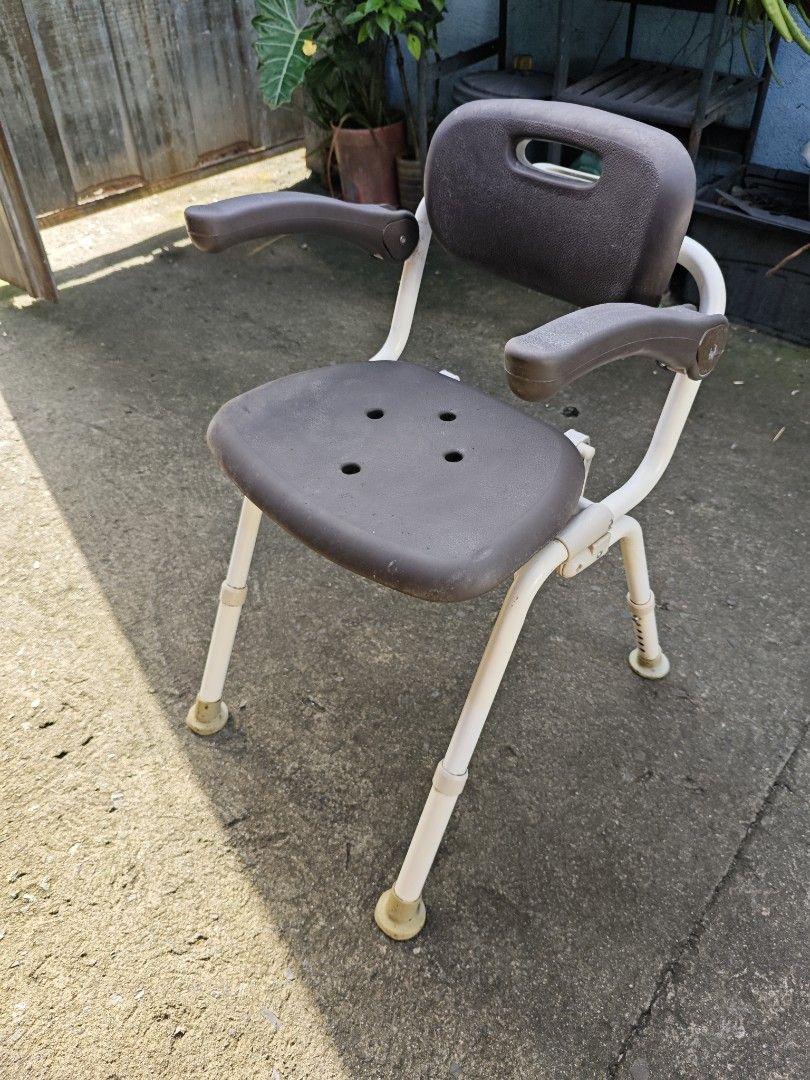 Panasonic Adjustable Bath and Shower Chair with Armrests (Category: Chairs) located in Quezon City. Submitted by jonandwhale (Listing ID 1468575131, Image 1). Description: - Brand: Panasonic - Features: Backrest, padded armrests, and drainage holes - Adjustable: Height-adjustable legs with secure rubber grip tips - Design: Sturdy frame in a grey and white color combination - Maintenance: Easy to adjust and clean - Fulfillment: Pick up preferred.