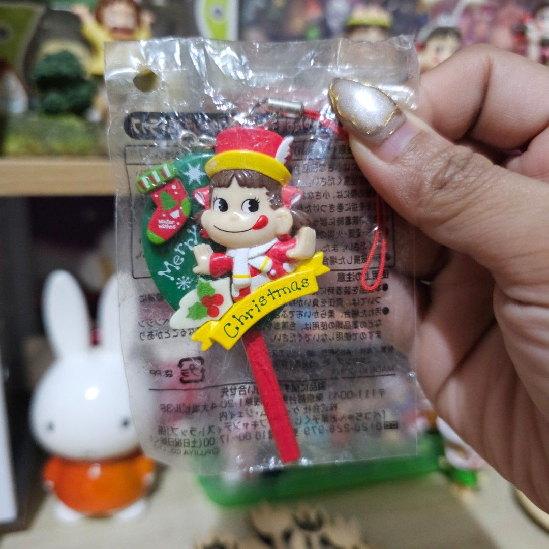 Peko-chan Christmas Pop Candy Strap Charm Keychain (Category: Charms) located in Manila. Submitted by lovelylovesjapan (Listing ID 1468510660, Image 1). Description: 🌸The item is on-hand and authentic from Japan 🌸Mode of Payment (MOP): GCASH/Bank Transfer 🌸Mode of Delivery (MOD): J&T or Lalamove (Shipping every Saturdays and Sundays) Notes: 🩷Breakable items are packed with care and caution. Seller will not be held liable for any damages incur