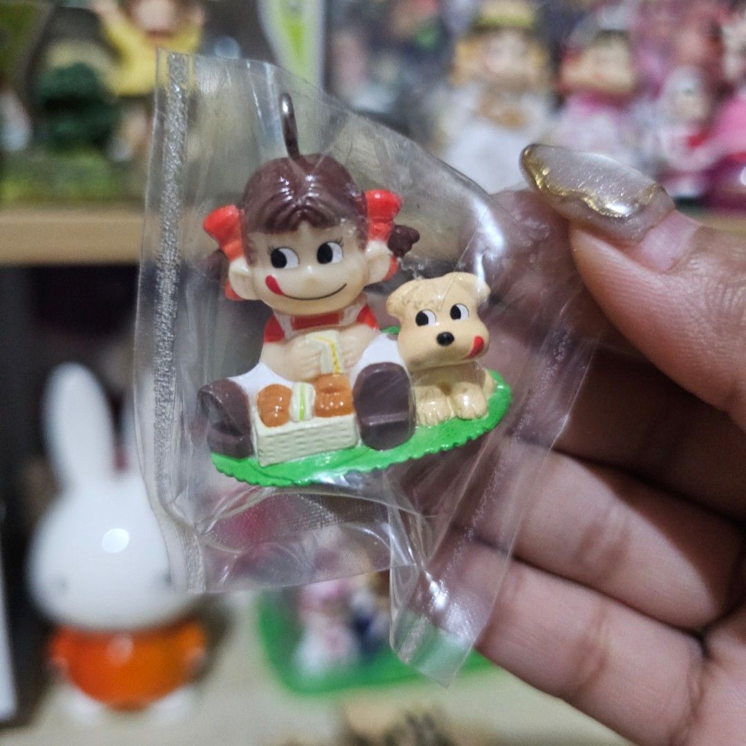 Peko-chan Miniature Charm (Category: Charms) located in Manila. Submitted by lovelylovesjapan (Listing ID 1468510268, Image 1). Description: 🌸The item is on-hand and authentic from Japan 🌸Mode of Payment (MOP): GCASH/Bank Transfer 🌸Mode of Delivery (MOD): J&T or Lalamove (Shipping every Saturdays and Sundays) Notes: 🩷Breakable items are packed with care and caution. Seller will not be held liable for any damages incurred by the courier upon d