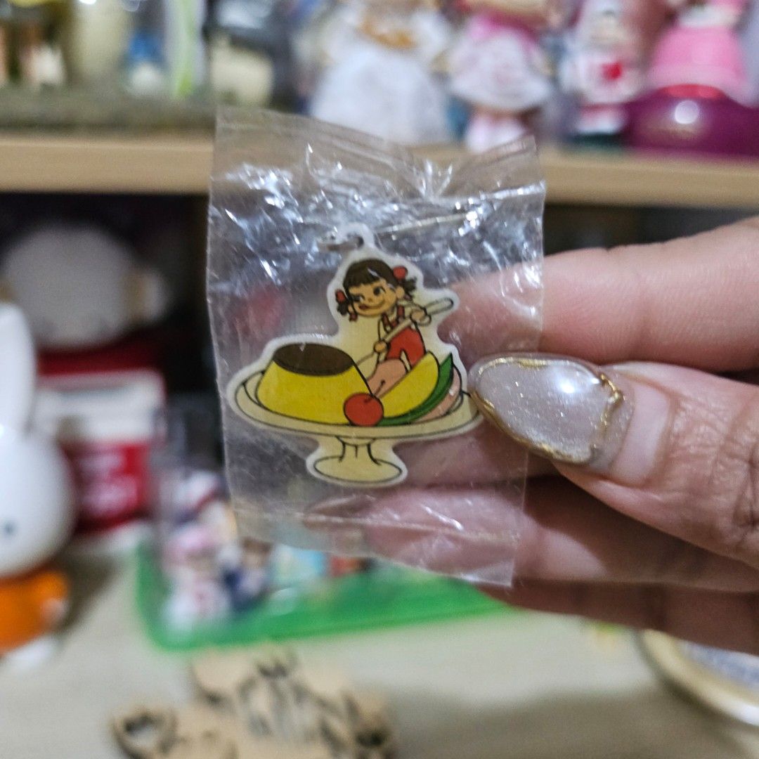 Peko-chan "Pudding à la Mode" Metal Charm (Category: Charms) located in Manila. Submitted by lovelylovesjapan (Listing ID 1468508821, Image 1). Description: 🌸The item is on-hand and authentic from Japan 🌸Mode of Payment (MOP): GCASH/Bank Transfer 🌸Mode of Delivery (MOD): J&T or Lalamove (Shipping every Saturdays and Sundays) Notes: 🩷Breakable items are packed with care and caution. Seller will not be held liable for any damages incurred by th