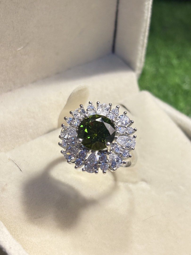 Peridot power ring gemstone (Category: Rings) located in Davao. Submitted by emmanuelchuamellorin23 (Listing ID 1468669044, Image 1). Description: 💚Peridot power ring gemstone Size7 adjustable Markings Au750 Rodium/ Platinum over copper based metal Tarnish resistant with extra care Message me directly📩.