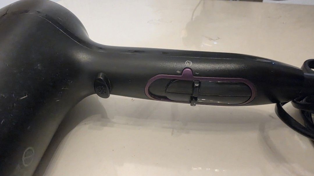 Philips ThermoProtect 2100W Hair Dryer (Category: Hair) located in Las Pinas. Submitted by sixtosengson (Listing ID 1468683387, Image 2). Description: - Brand/Model: Philips ThermoProtect 2100W Hair Dryer - Color: Sleek Black - Performance: Multiple speed and heat settings with a cool shot button for styling - Condition: Clean heating coils, fully functional, works great for daily use - Plug Type: Standard two-prong plug included.