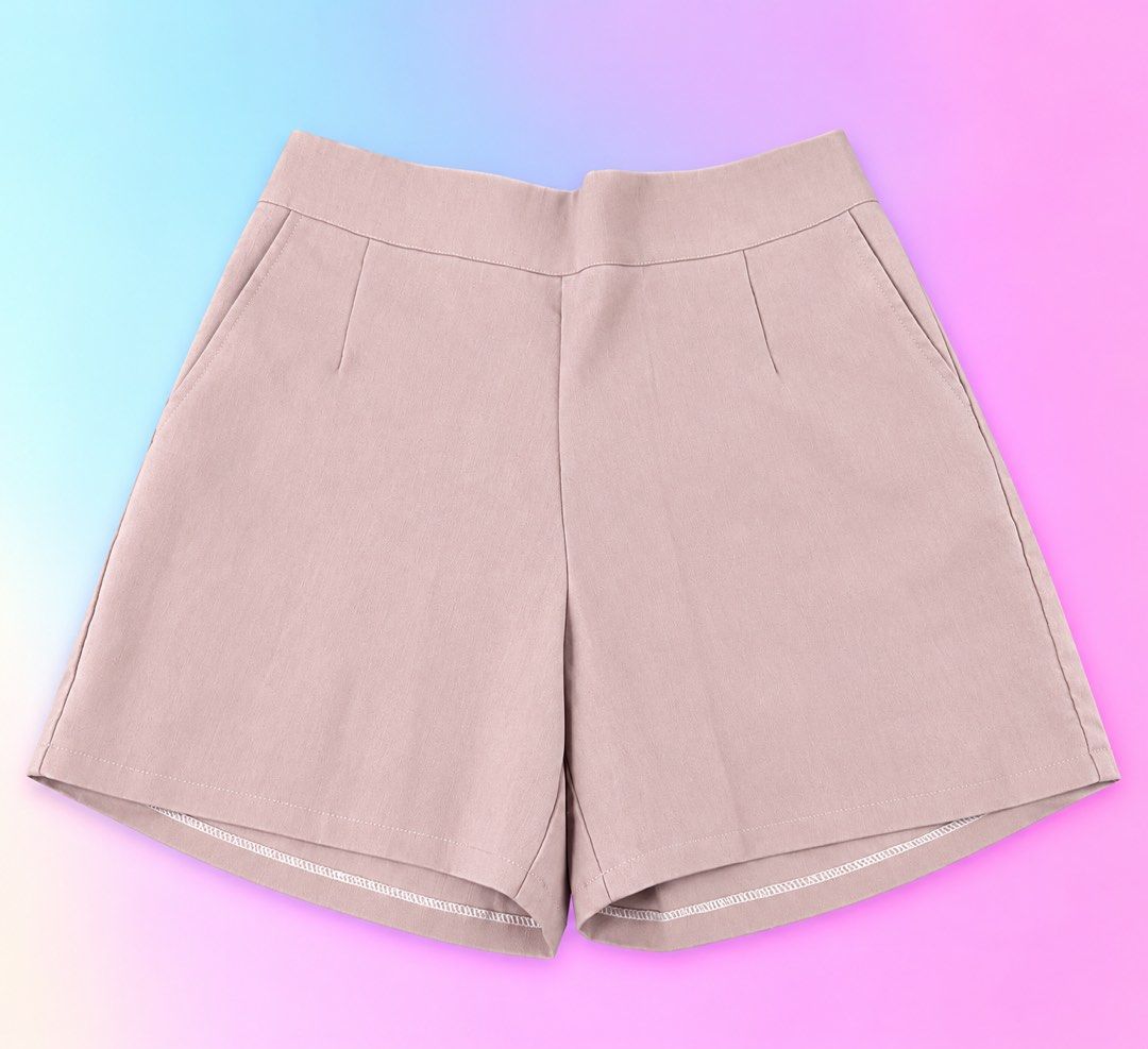 Pink High-Waisted Tailored Shorts with Pockets (Category: Shorts) located in Quezon City. Submitted by turtleandfishes (Listing ID 1468676083, Image 1). Description: - Color: Dusty pink - Fit: High waist with structured front darts - Waistband: Elastic at the back for comfort - Pockets: Two functional side pockets - Finish: Clean hem - Sizing: Flat lay measurements available in photos.