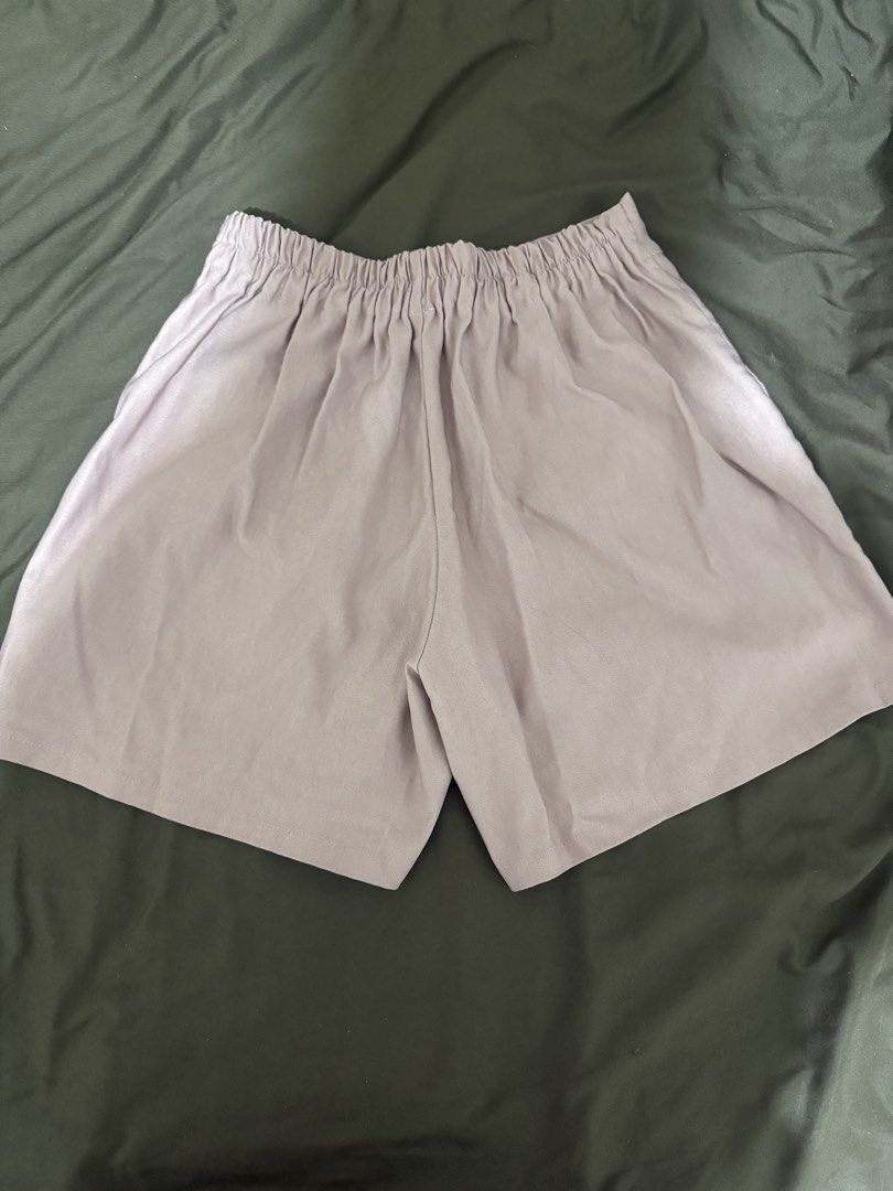 Pink High-Waisted Tailored Shorts with Pockets (Category: Shorts) located in Quezon City. Submitted by turtleandfishes (Listing ID 1468676083, Image 2). Description: - Color: Dusty pink - Fit: High waist with structured front darts - Waistband: Elastic at the back for comfort - Pockets: Two functional side pockets - Finish: Clean hem - Sizing: Flat lay measurements available in photos.