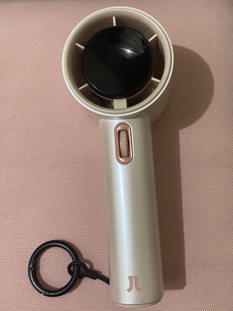 Pink Jisulife Fan Pro1 (Category: Fans) located in Manila. Submitted by ccinh09135 (Listing ID 1468679902, Image 1). Description: 📍Sampaloc Manila - Model: Jisulife Handheld Fan Pro1 - Color: Pink - Store price: ₱2,114 - Condition: Clean body with minimal signs of wear - comes with type C cord and drawstring mini bag (no box).