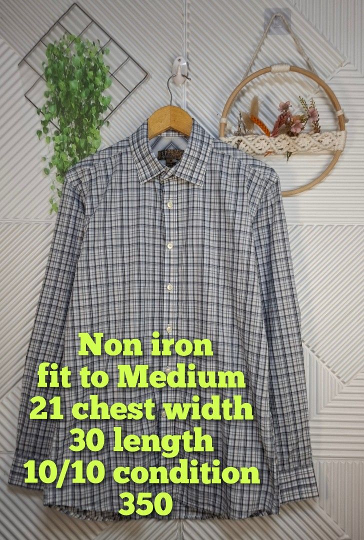 Plaid Long Sleeve Button Down Shirt Size M (Category: Sets & Coordinates) located in Bulacan. Submitted by cathycampo51092 (Listing ID 1468625099, Image 2). Description: - Style: Classic plaid long sleeve button-down shirt - Fabric: Non-iron / easy-care material - Size: Fits Medium - Measurements: Chest width 21" | Length 30" - Details: Standard collar and front button closure - Condition: Excellent, ready to wear.