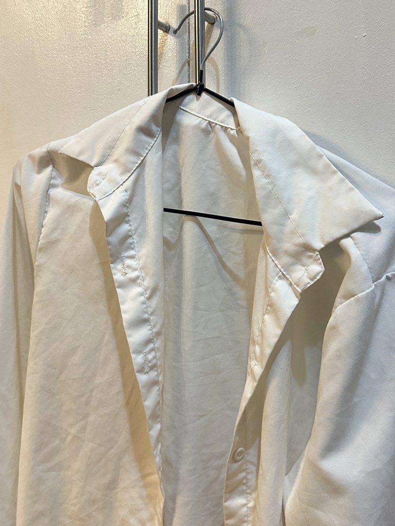 Plain white long sleeve polo (Category: Longsleeves) located in Rizal. Submitted by nixx__ (Listing ID 1468578300, Image 2). Description: - Basic white long-sleeve button-up shirt - Classic collar with front button closure - Lightweight fabric that is easy to style for casual or formal outfits - Standard fit for comfortable wear - Great versatile staple piece for any wardrobe - Note: Needs a quick iron before wearing, otherwise ready to go.