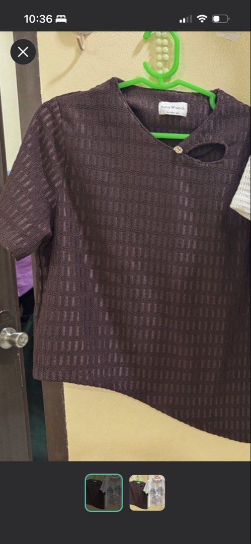 Plains & Prints Brown Short Sleeve Top (Category: Blouses) located in Iba. Submitted by geliqq (Listing ID 1468657981, Image 2). Description: - Brand: Plains & Prints - Color: Dark Brown - Style: Short sleeve blouse with relaxed fit - Details: Textured grid pattern, unique neckline cutout with a gold-tone accent button, and trendy asymmetrical hem - Versatility: Easy to dress up for work or down for casual days - Condition: Excellent pre-loved co