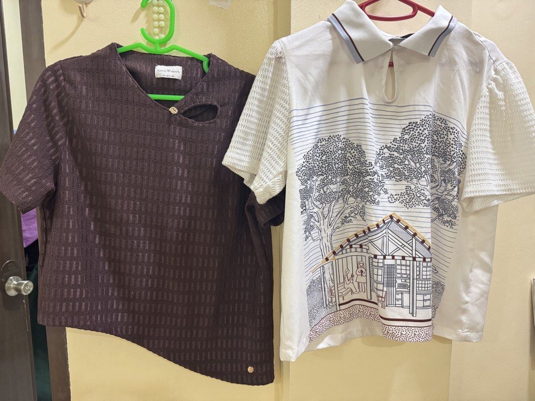 Plains & Prints Tops Buy 1 take 1 (Category: Blouses) located in Iba. Submitted by geliqq (Listing ID 1468657403, Image 1). Description: - Bundle of 2 stylish short-sleeve shirts in clean, ready-to-wear condition - Shirt 1: Dark brown Plains & Prints top with a unique textured pattern and asymmetrical hem - Shirt 2: White top featuring textured sleeves, a collared keyhole neckline, and a detailed house and tree graphic - Versatile designs that pa