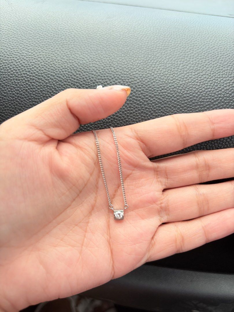 Platinum PT with diamond (Category: Necklaces) located in Manila. Submitted by agith21 (Listing ID 1468599646, Image 2). Description: - platinum chain necklace - Features a single sparkling diamond for a subtle shine - Delicate link chain with a secure spring ring clasp - Minimalist and versatile design, perfect for daily wear or layering.